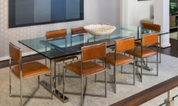 Gorgeous glass dining table with tasteful modern leather dining chairs, Pamela Hope Designs, Houston, TX