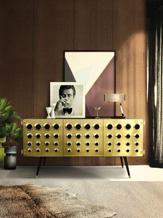 This masculine room uses a unique dresser to make a statement