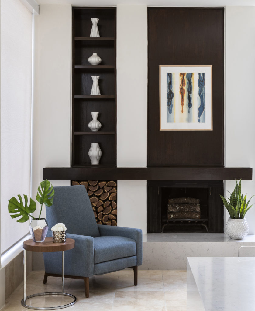 Natural Elements into Décor - Stacked Wood near the Fireplace Creates a Display with Natural Elements