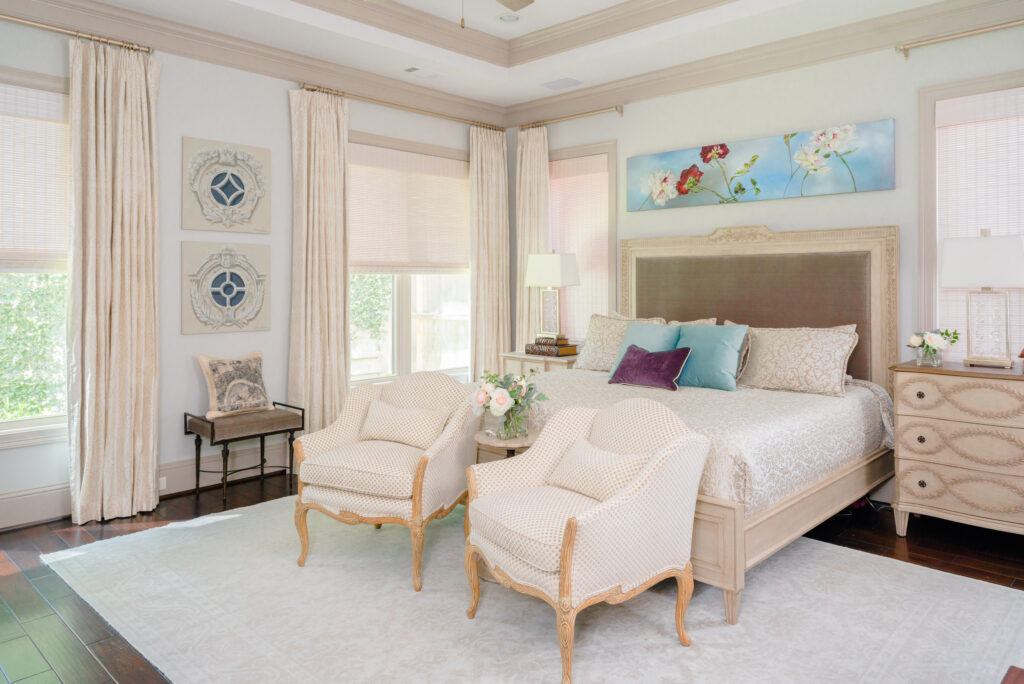 a place to sit is key in a master bedroom