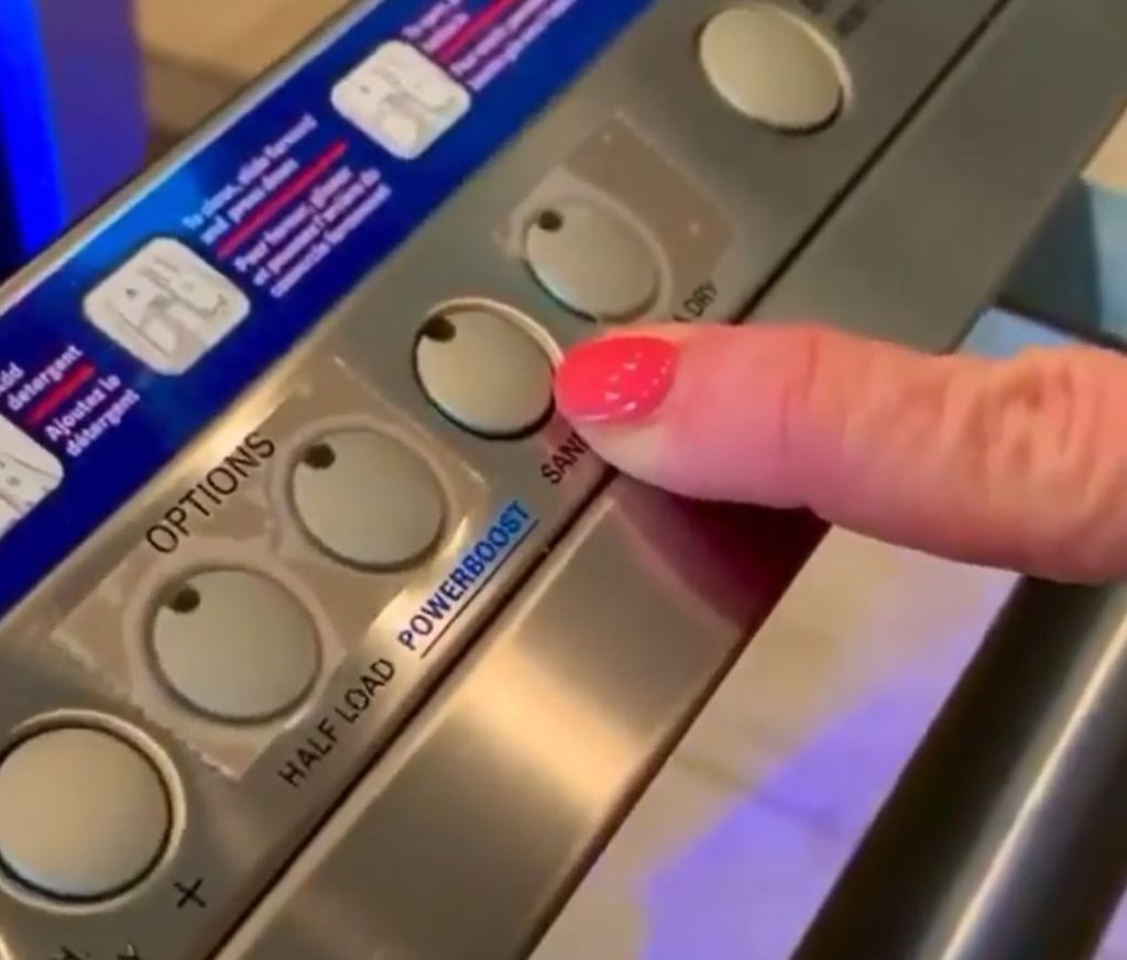 sanitizing button on a dishwasher's settings
