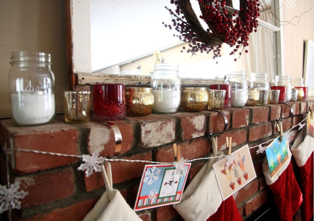 Combine Christmas cards and stockings on your mantel for a charming look.