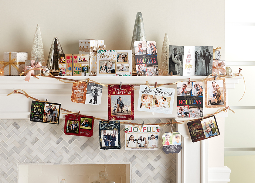 Christmas cards tucked along the mantelpiece offer an economical way to decorate.
