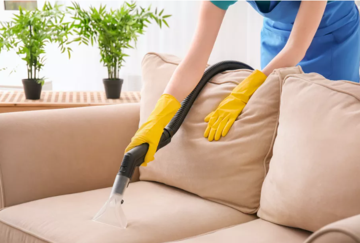 clean upholstery by vacuuming weekly