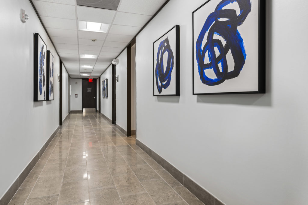 Art that ties into the branding is hung on office walls for a polished look